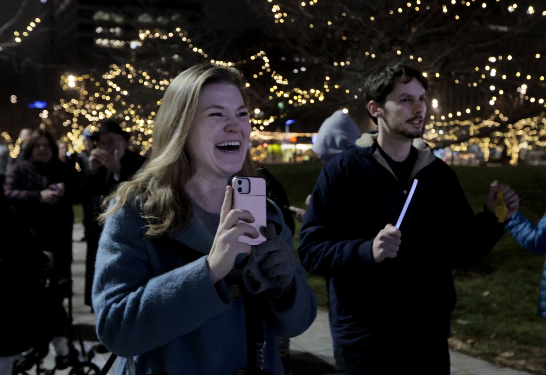 About two dozen people attend Night 6 of Chanukah Menorah Lighting